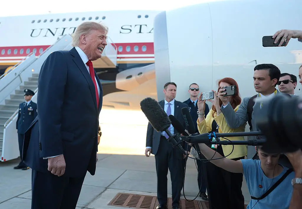 A distinct, rectangular protrusion was visible under the back of Trump's jacket this week. Credit: Anna Moneymaker / Getty