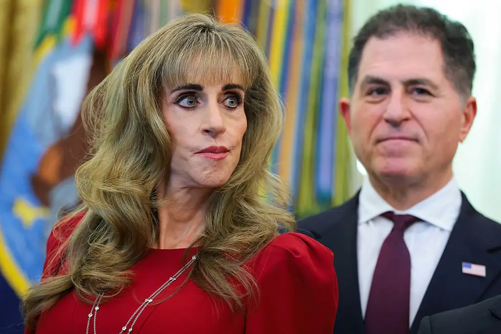 The woman in the red dress is Susan Dell, the wife of Dell Technologies CEO. Credit: Anna Moneymaker / Getty