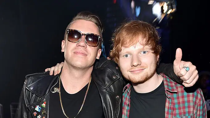 Ed Sheeran's team removed Macklemore from his tour. Credit: Theo Wargo/Getty Images for iHeartMedia