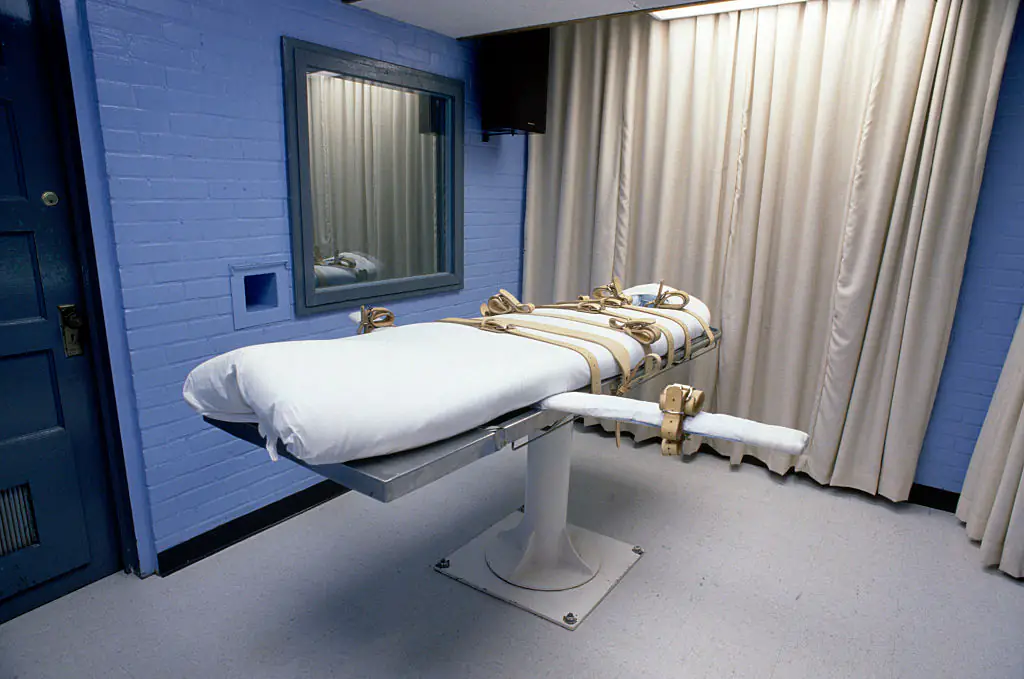 Inmates are strapped to a table for the lethal injection. Credit: Gregory Smith / Getty