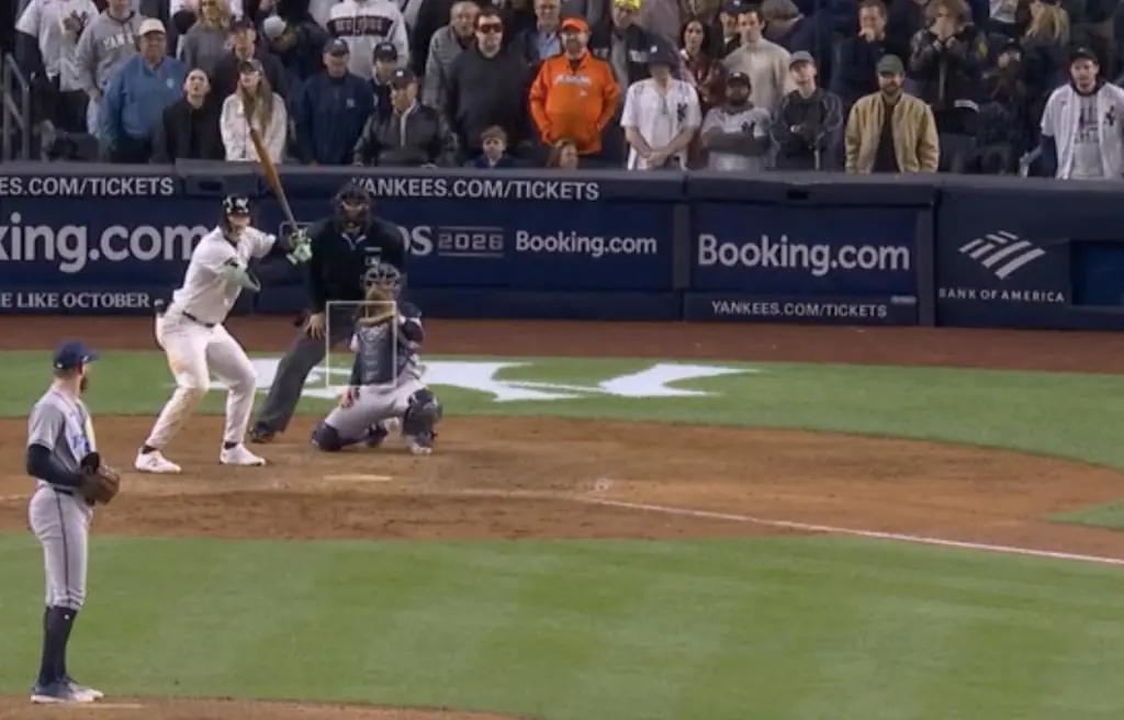 Marlins Man (in orange) is seen standing right next to Lipa and Turner. Credit: TNT Sports