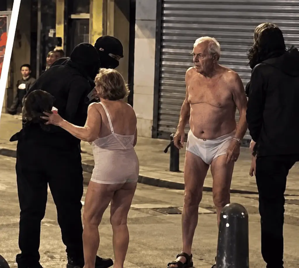 An AI-generated image of an elderly couple during the Paris riots. Credit: X