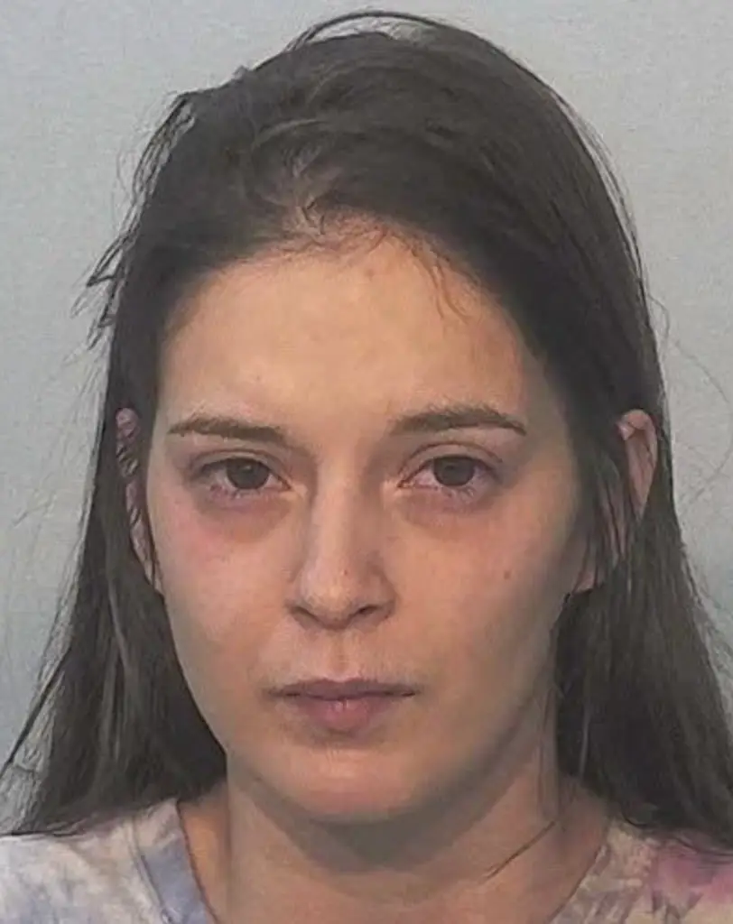 Cassie Snay was charged with two counts of bestiality after authorities found videos of her sexually engaging with a dog. Credit: Allen County Sheriff's Department