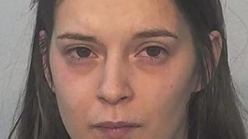 Cassie Snay was charged with two counts of bestiality after authorities found videos of her sexually engaging with a dog. Credit: Allen County Sheriff's Department