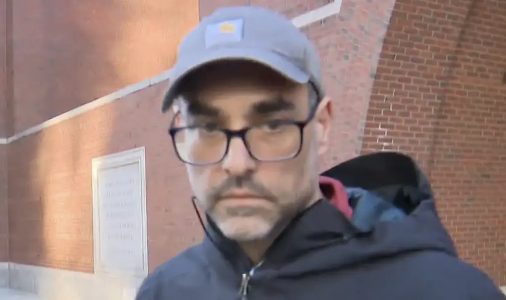 Jonathan Alan Lefman sexually assaulted a girl on a flight, while with his wife and four children. Credit: CBS News