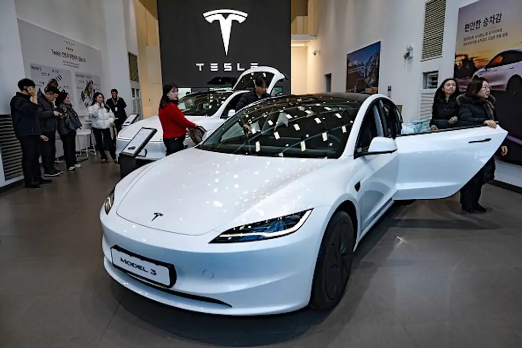 The Tesla Model 3 is cheaper than a BMW in the long run. Credit: Chris Jung/NurPhoto via Getty Images