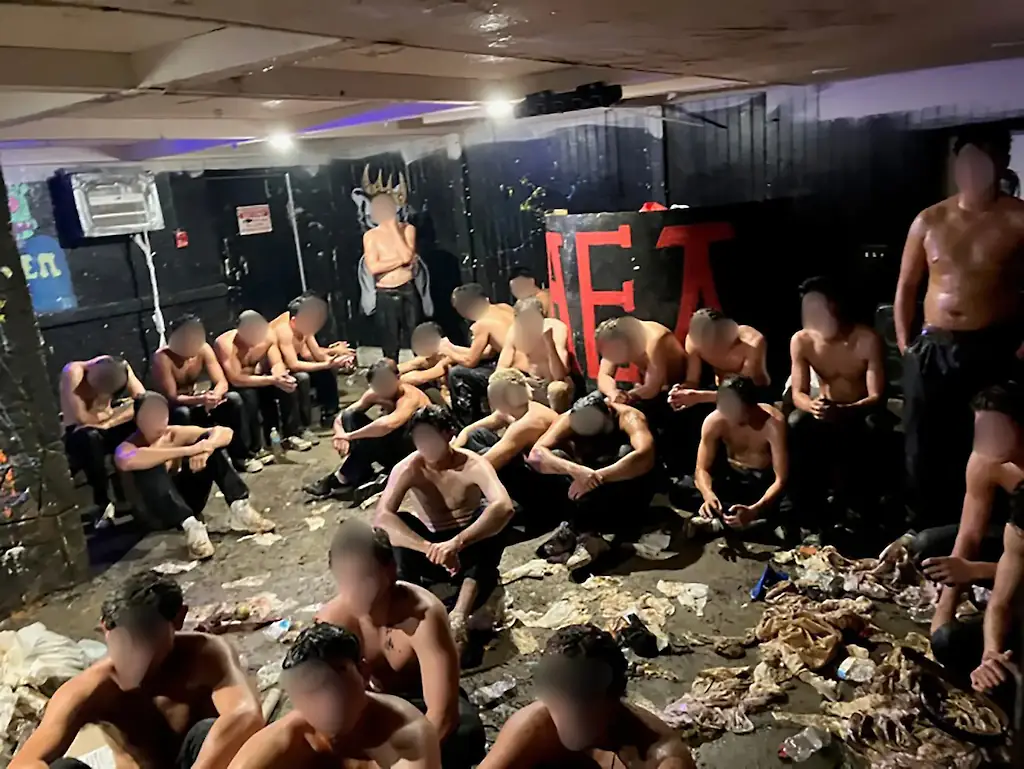 Cops found 30 naked pledges huddled in a filthy, hot basement. Credit: Madison Police Department